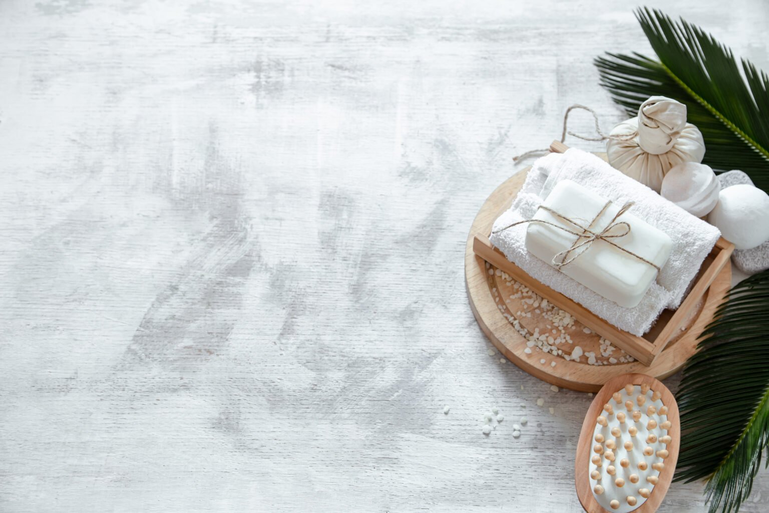 spa composition with care items on a light background